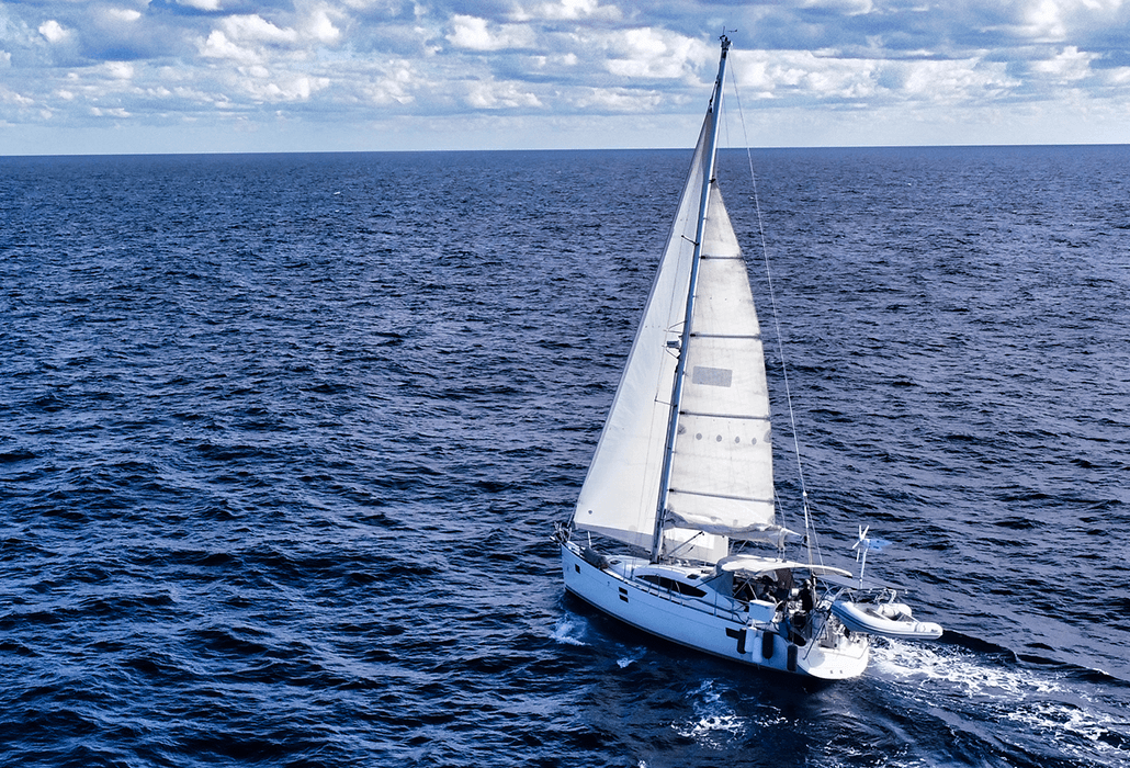 Offshore training students aboard an Elan sailing yacht underway in open water